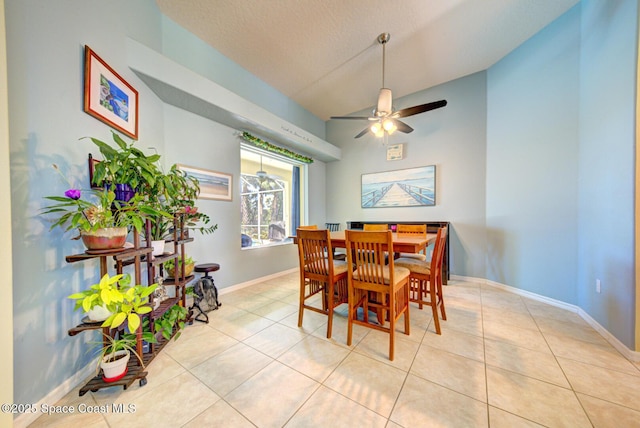 1772 Windbrook Dr SE, Palm Bay, FL 32909 - dining room featuring light tile patterned flooring, a textured ceiling, a ceiling fan, and baseboards