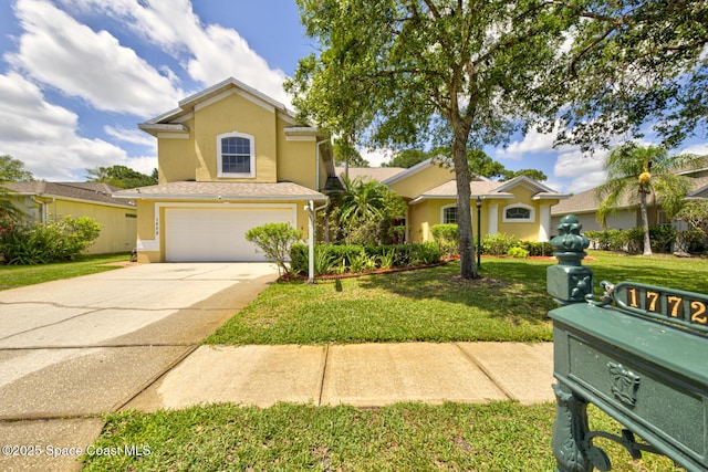 1772 Windbrook Dr SE, Palm Bay, FL 32909 - mediterranean / spanish-style house with stucco siding, an attached garage, driveway, and a front yard