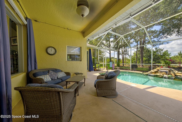 1772 Windbrook Dr SE, Palm Bay, FL 32909 - outdoor pool with outdoor lounge area, glass enclosure, and a patio