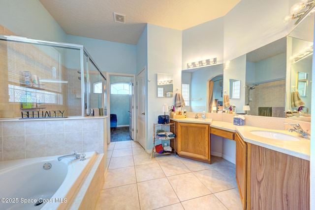 1772 Windbrook Dr SE, Palm Bay, FL 32909 - full bath featuring a shower stall, tile patterned flooring, visible vents, a sink, and a bath