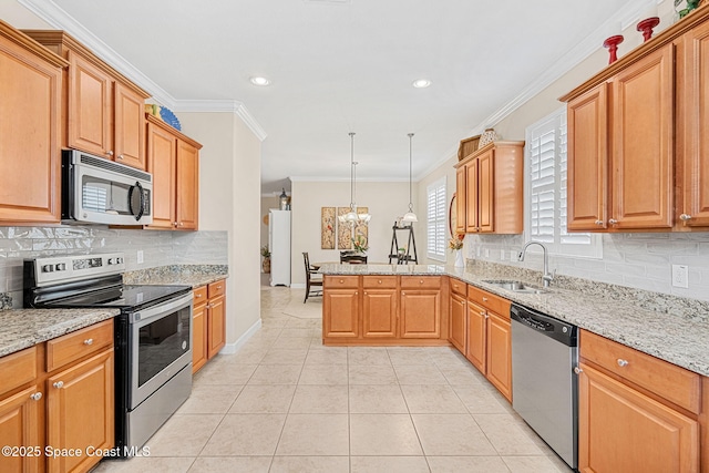 kitchen with a sink, appliances with stainless steel finishes, a peninsula, light stone countertops, and backsplash