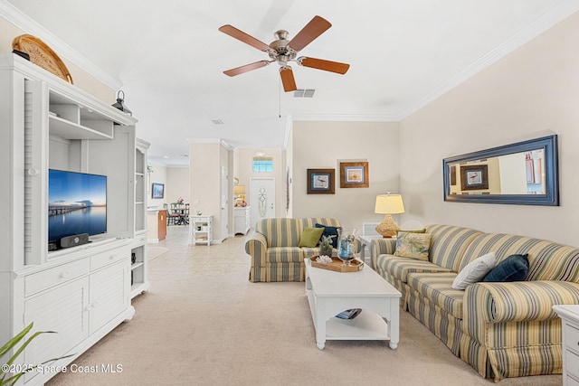 living area featuring crown molding, light colored carpet, a ceiling fan, visible vents, and baseboards