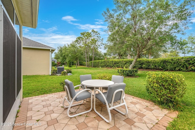 view of patio / terrace featuring central AC unit and outdoor dining area