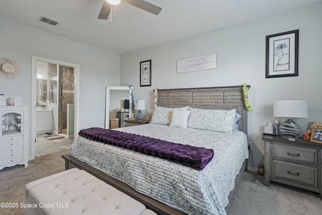 bedroom featuring visible vents, ceiling fan, connected bathroom, and carpet floors