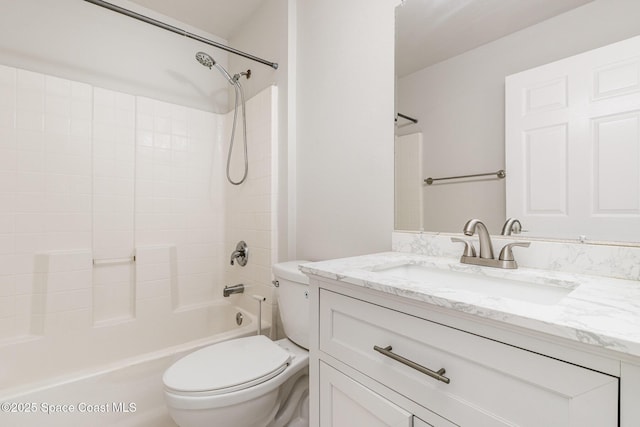 full bathroom with toilet, vanity, and shower / bath combination
