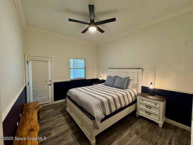 572 Lake Ashley Cir, Melbourne, FL 32904 - bedroom with dark wood finished floors, baseboards, ornamental molding, and a ceiling fan