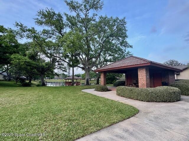 572 Lake Ashley Cir, Melbourne, FL 32904 - view of property's community featuring a yard, a gazebo, and a water view