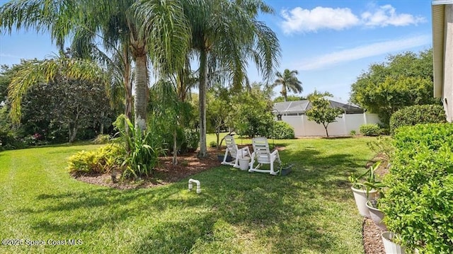 view of yard featuring a lanai