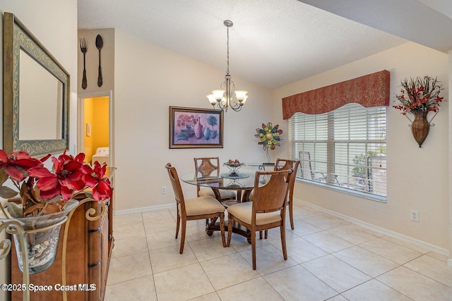 6109 Meghan Dr, Melbourne, FL 32940 - dining area with a chandelier, vaulted ceiling, baseboards, light tile patterned floors, and a textured ceiling