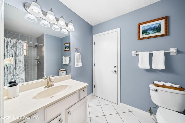 full bathroom with tiled shower, vanity, toilet, tile patterned floors, and baseboards