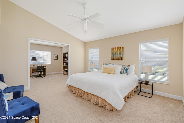 2842 Galindo Cir, Melbourne, FL 32940 - bedroom with a ceiling fan, baseboards, lofted ceiling, and light colored carpet