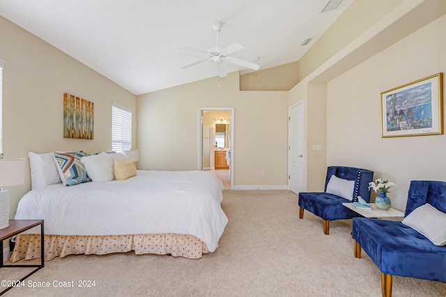 2842 Galindo Cir, Melbourne, FL 32940 - bedroom featuring visible vents, connected bathroom, a ceiling fan, vaulted ceiling, and light colored carpet