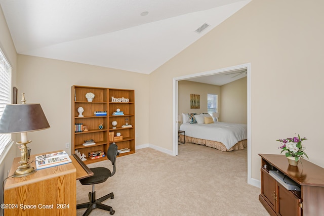2842 Galindo Cir, Melbourne, FL 32940 - office area with plenty of natural light, light colored carpet, and lofted ceiling