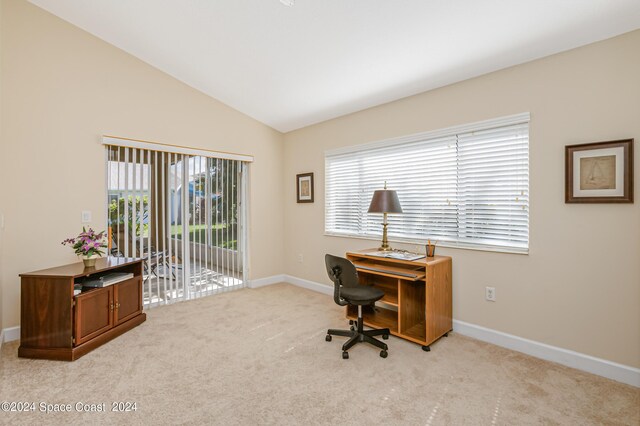 2842 Galindo Cir, Melbourne, FL 32940 - carpeted home office with baseboards and vaulted ceiling