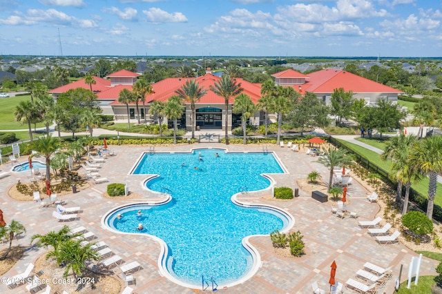 2842 Galindo Cir, Melbourne, FL 32940 - pool with fence and a patio area