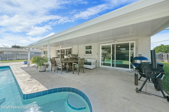 1117 Cheyenne Dr, Indian Harbour Beach, FL 32937 - view of swimming pool featuring a fenced in pool, outdoor dining area, fence, and a patio