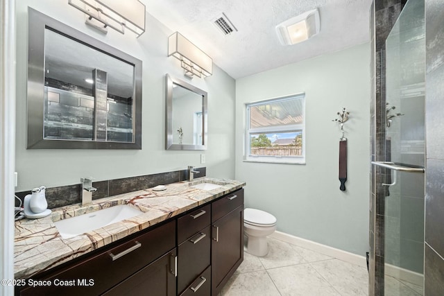 1117 Cheyenne Dr, Indian Harbour Beach, FL 32937 - full bathroom with toilet, a sink, double vanity, and visible vents