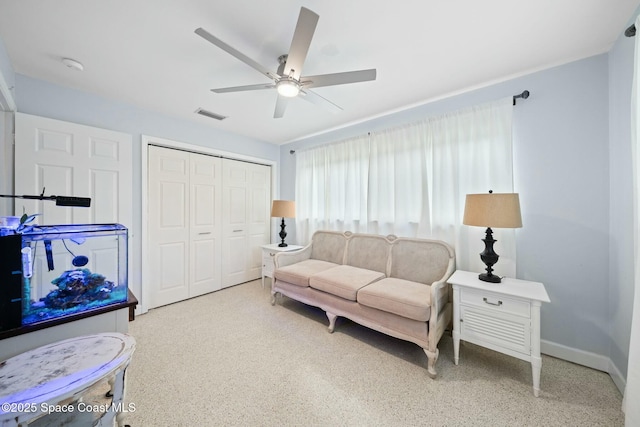1117 Cheyenne Dr, Indian Harbour Beach, FL 32937 - living area featuring baseboards, ceiling fan, and visible vents