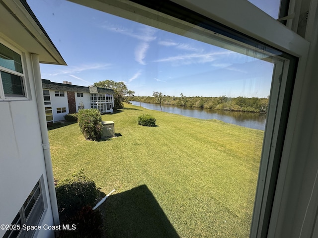 view of yard with a water view