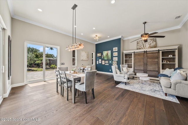 dining area featuring dark wood-style flooring, baseboards, and recessed lighting