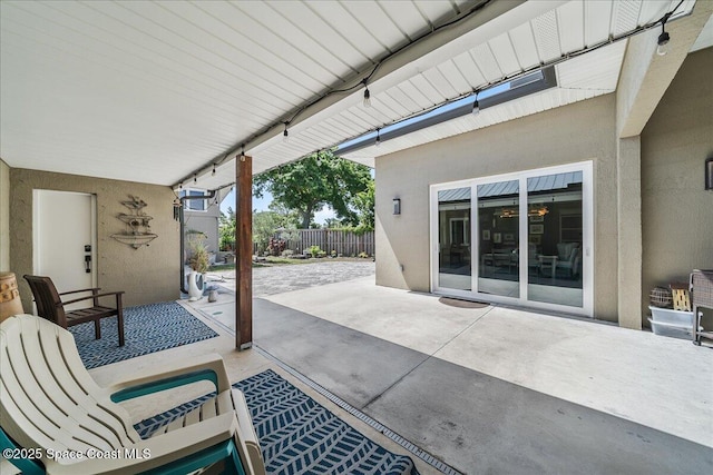 view of patio / terrace with fence