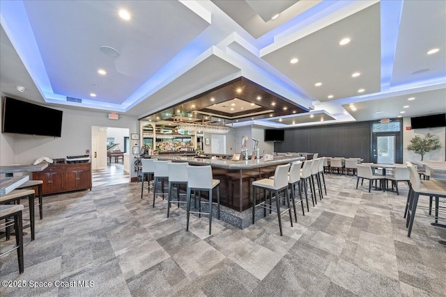 1253 Saint Andrews Dr, Rockledge, FL 32955 - interior space featuring recessed lighting, indoor wet bar, visible vents, and a raised ceiling