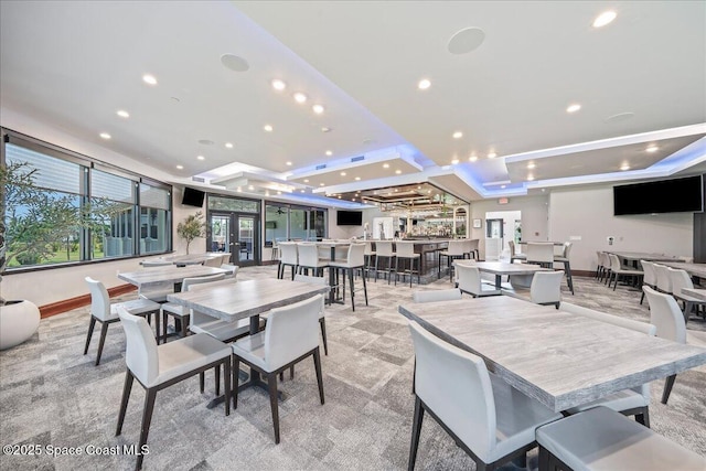 1253 Saint Andrews Dr, Rockledge, FL 32955 - dining room featuring a tray ceiling, baseboards, recessed lighting, and visible vents