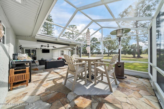 1253 Saint Andrews Dr, Rockledge, FL 32955 - sunroom / solarium with outdoor dining area, outdoor lounge area, and ceiling fan