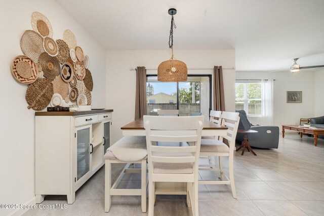 6575 Topaz Dr, Grant, FL 32949 - dining area featuring light tile patterned flooring