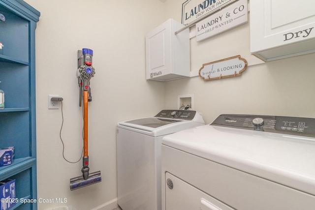 6575 Topaz Dr, Grant, FL 32949 - laundry room with independent washer and dryer, baseboards, and cabinet space