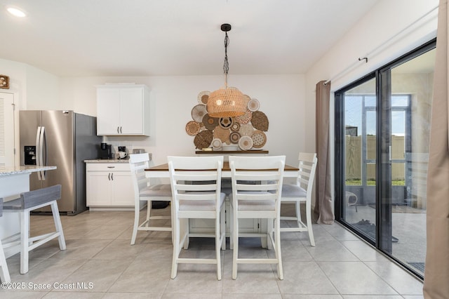 6575 Topaz Dr, Grant, FL 32949 - dining room featuring light tile patterned floors