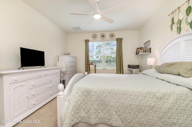 6575 Topaz Dr, Grant, FL 32949 - bedroom with visible vents, light colored carpet, and ceiling fan