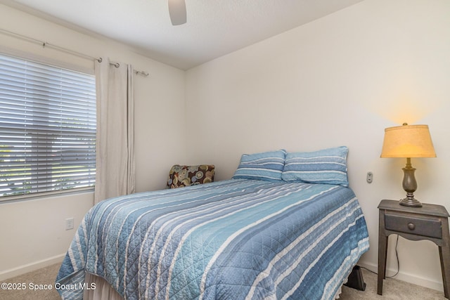 6575 Topaz Dr, Grant, FL 32949 - bedroom featuring carpet flooring, baseboards, and ceiling fan