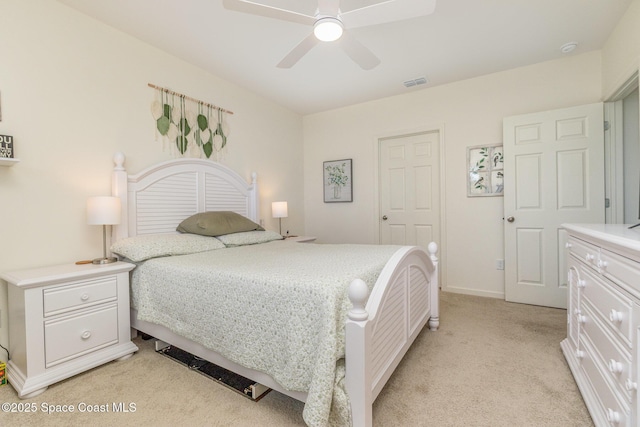 6575 Topaz Dr, Grant, FL 32949 - bedroom with visible vents, ceiling fan, light colored carpet, and baseboards