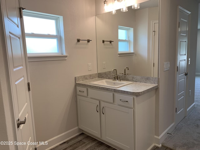 1099 Hanson Ave SW, Palm Bay, FL 32908 - bathroom with vanity and baseboards