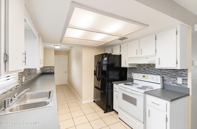 kitchen with light tile patterned floors, electric range, under cabinet range hood, visible vents, and a sink