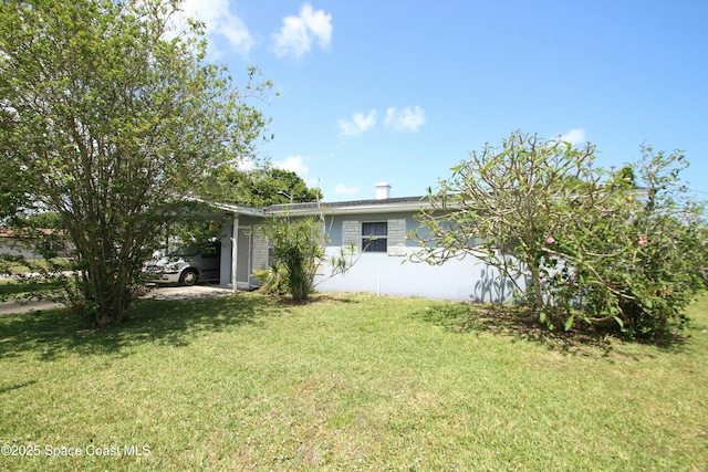 1798 Hudson Cir S, Melbourne, FL 32935 - exterior space with an attached carport