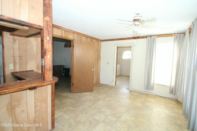 1798 Hudson Cir S, Melbourne, FL 32935 - unfurnished living room with a ceiling fan and light floors
