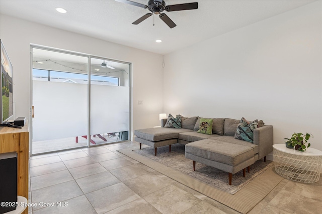 living room with recessed lighting, light tile patterned floors, and a ceiling fan