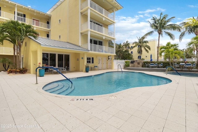 1 Eighth Ave Unit 1204, Indialantic, FL 32903 - community pool with a patio area