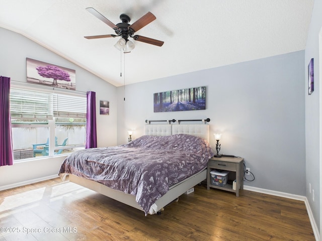 2515 SE Marquez Ave SE, Palm Bay, FL 32909 - bedroom with wood finished floors, baseboards, a ceiling fan, and lofted ceiling