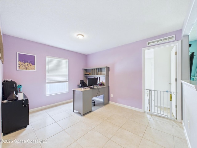 2515 SE Marquez Ave SE, Palm Bay, FL 32909 - office space with visible vents, baseboards, and light tile patterned flooring