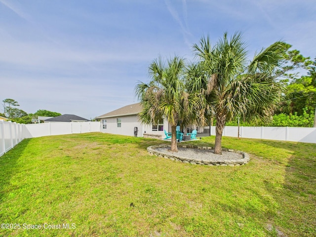 2515 SE Marquez Ave SE, Palm Bay, FL 32909 - view of yard featuring a fenced backyard