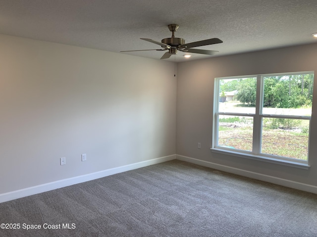 2205 Sans Souci Ave SE, Palm Bay, FL 32909 - unfurnished room featuring ceiling fan, carpet floors, and a textured ceiling