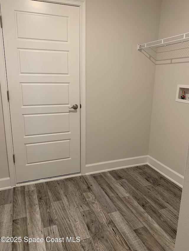 2205 Sans Souci Ave SE, Palm Bay, FL 32909 - washroom featuring dark wood-style floors and washer hookup