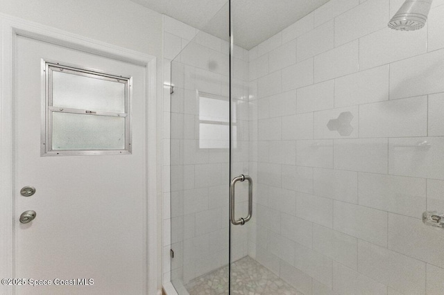 full bathroom featuring a stall shower