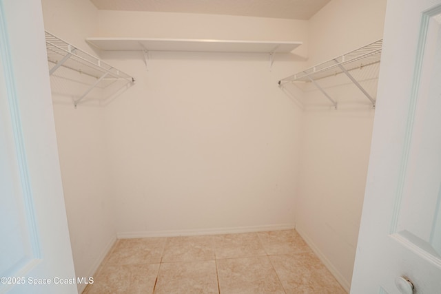 3780 Starlight Ave, Merritt Island, FL 32953 - walk in closet featuring light tile patterned flooring