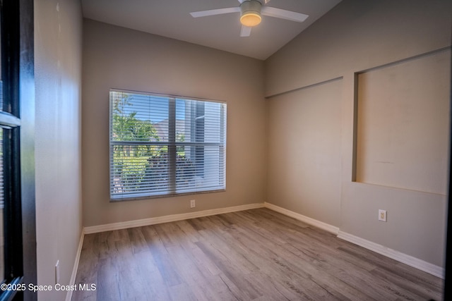 3780 Starlight Ave, Merritt Island, FL 32953 - unfurnished room with ceiling fan, baseboards, vaulted ceiling, and wood finished floors