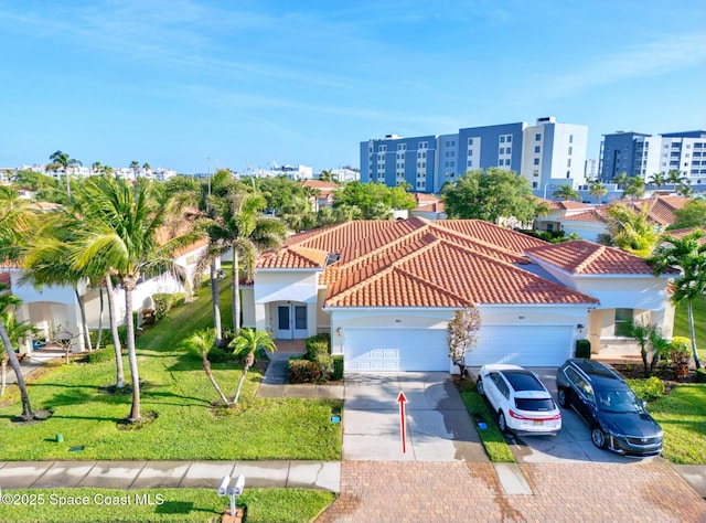 8657 Villanova Dr Unit 901, Cape Canaveral, FL 32920 - drone / aerial view featuring a view of city