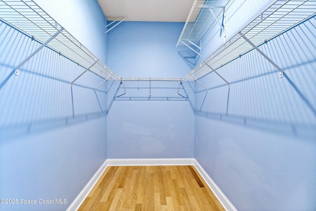 8657 Villanova Dr Unit 901, Cape Canaveral, FL 32920 - spacious closet with wood finished floors